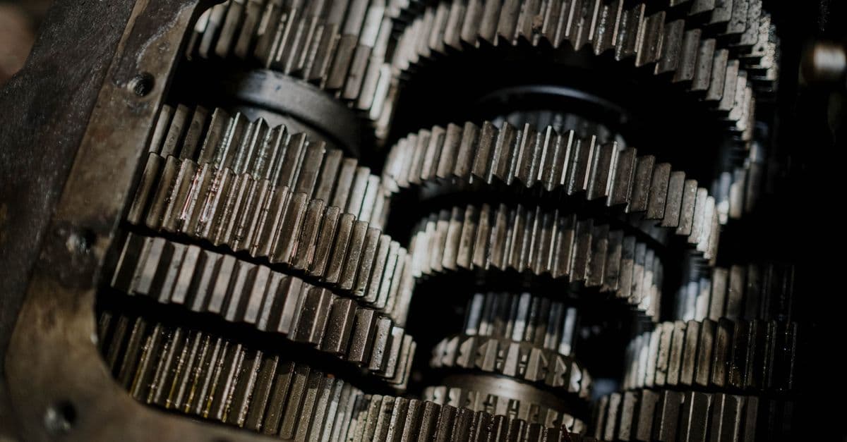 Detailed shot of mechanical gears showing steel parts and engineering precision.